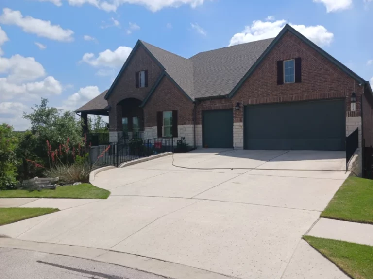 Brick House with Blue Garage